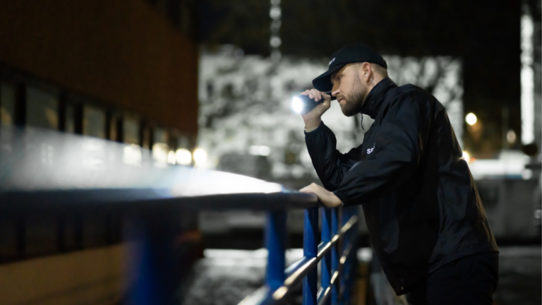 Security Guard Walking Building Perimeter